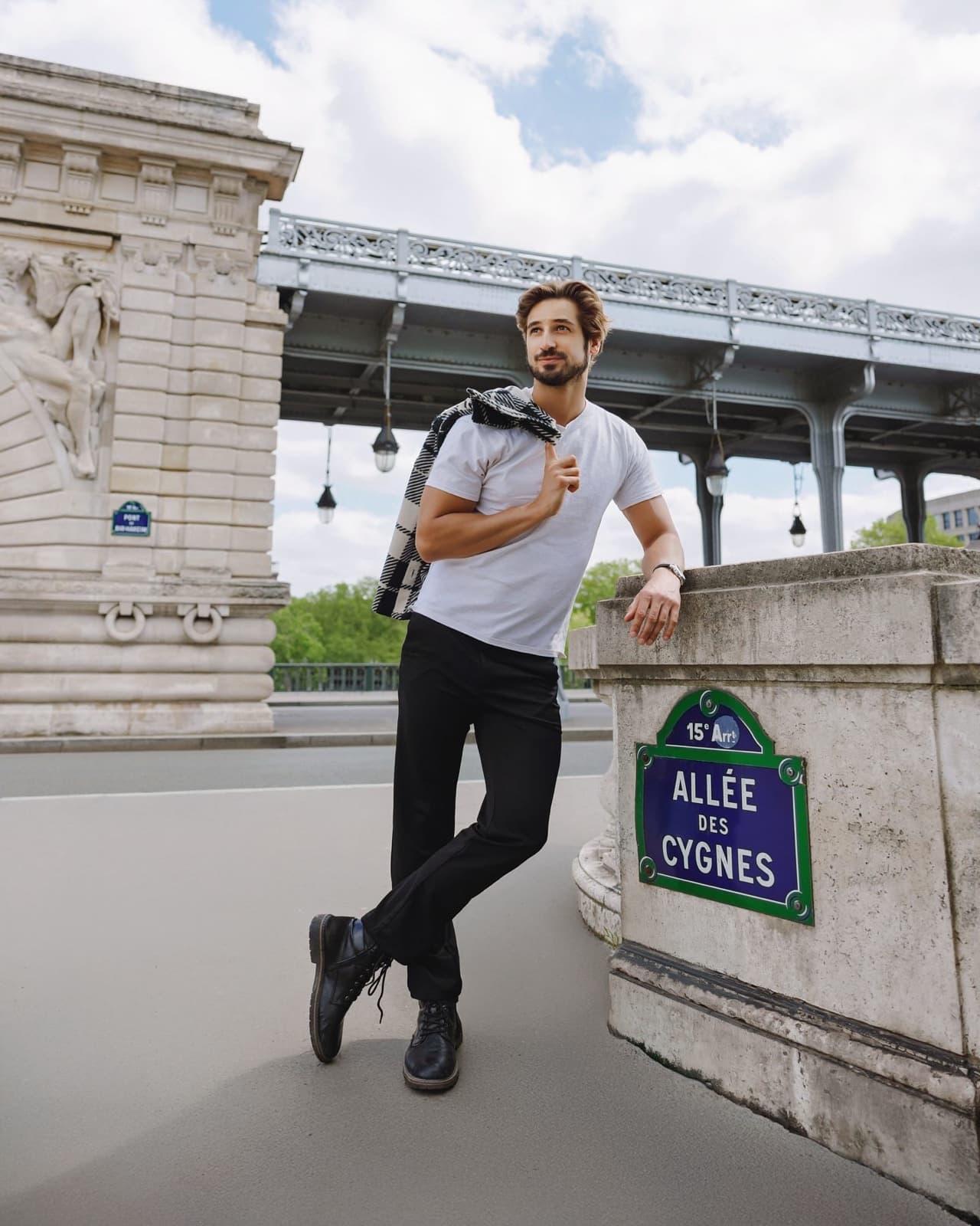 Man on the Pont de Bir-Hakeim bridge during a Paris photo session by SabShots
