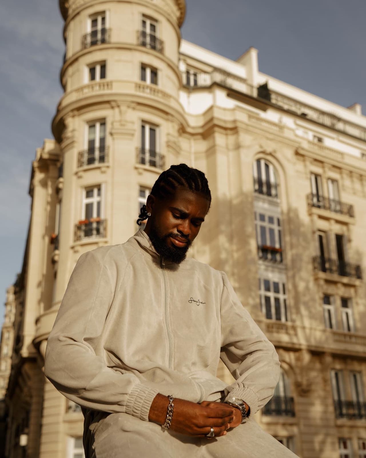 Man in a Haussmann street during a Paris street style session by SabShots