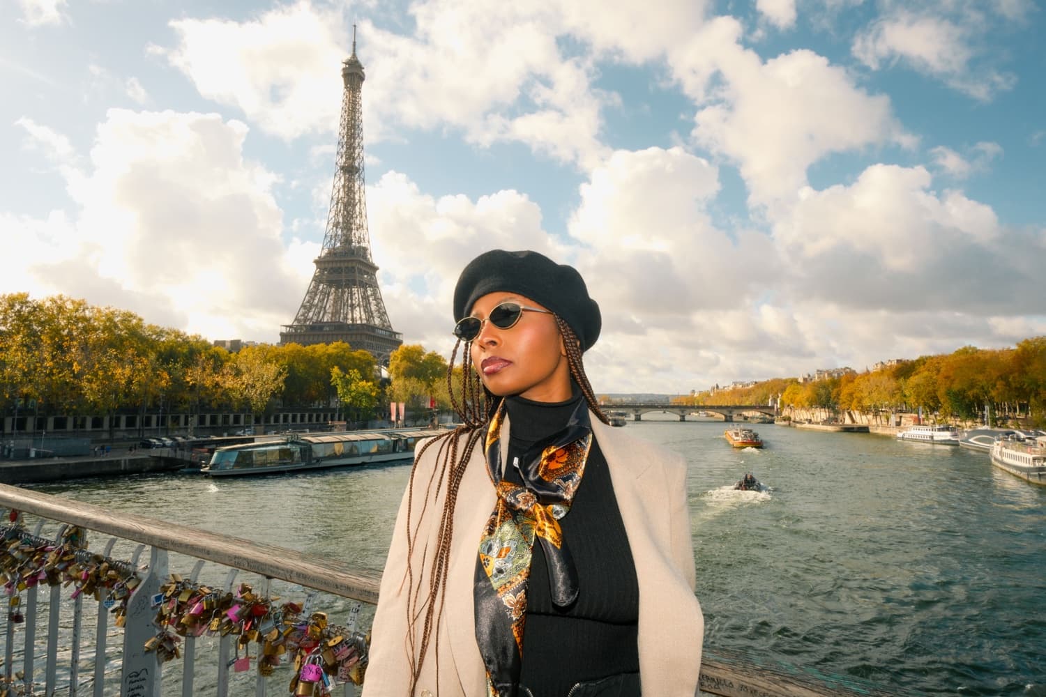Woman in a beret on Pont de Bir-Hakeim with the Eiffel Tower and the Seine in Paris by SabShots
